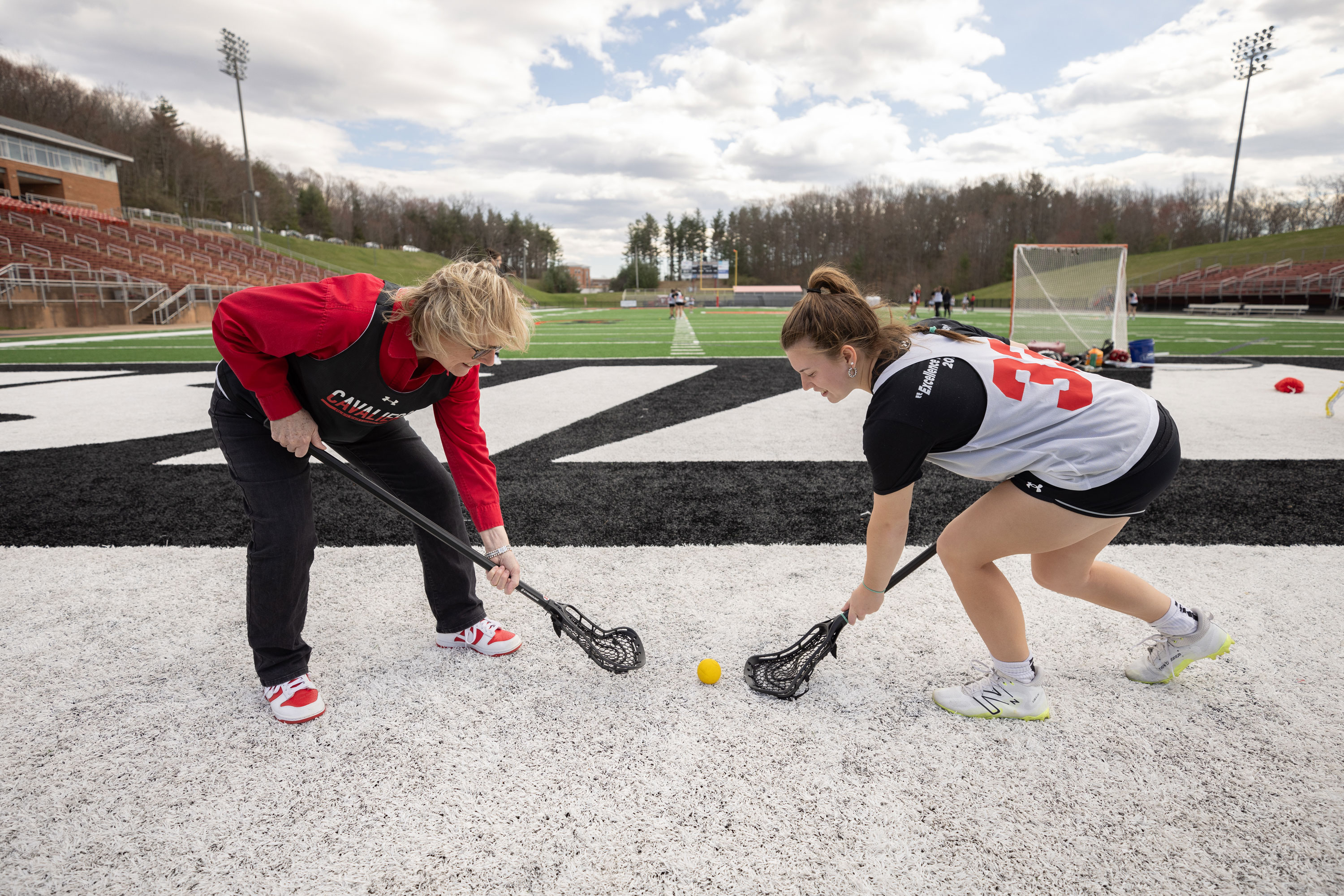 Chancellor Henry at lacrosse practice