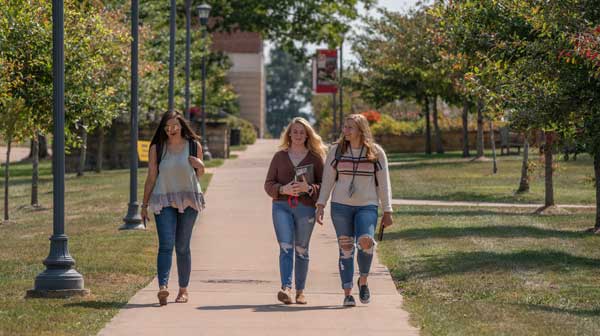 students walking on campus