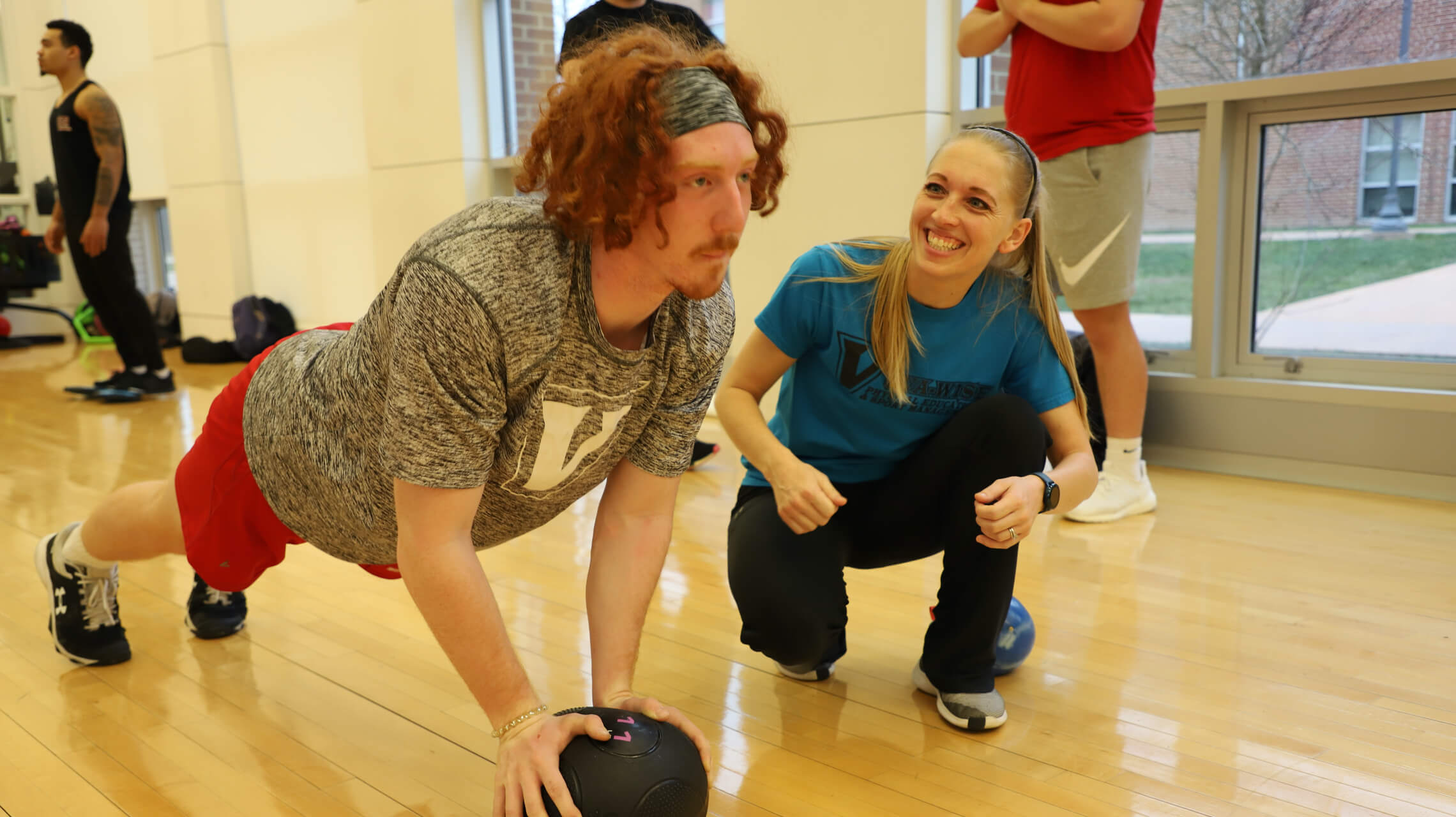 Professor Sanders coaching a student