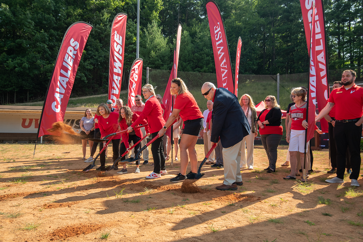 Rhonda Perkins, Kendall Rainey, Chancellor Henry, Karen Bitter, Lewey Lee breaking ground for softball field