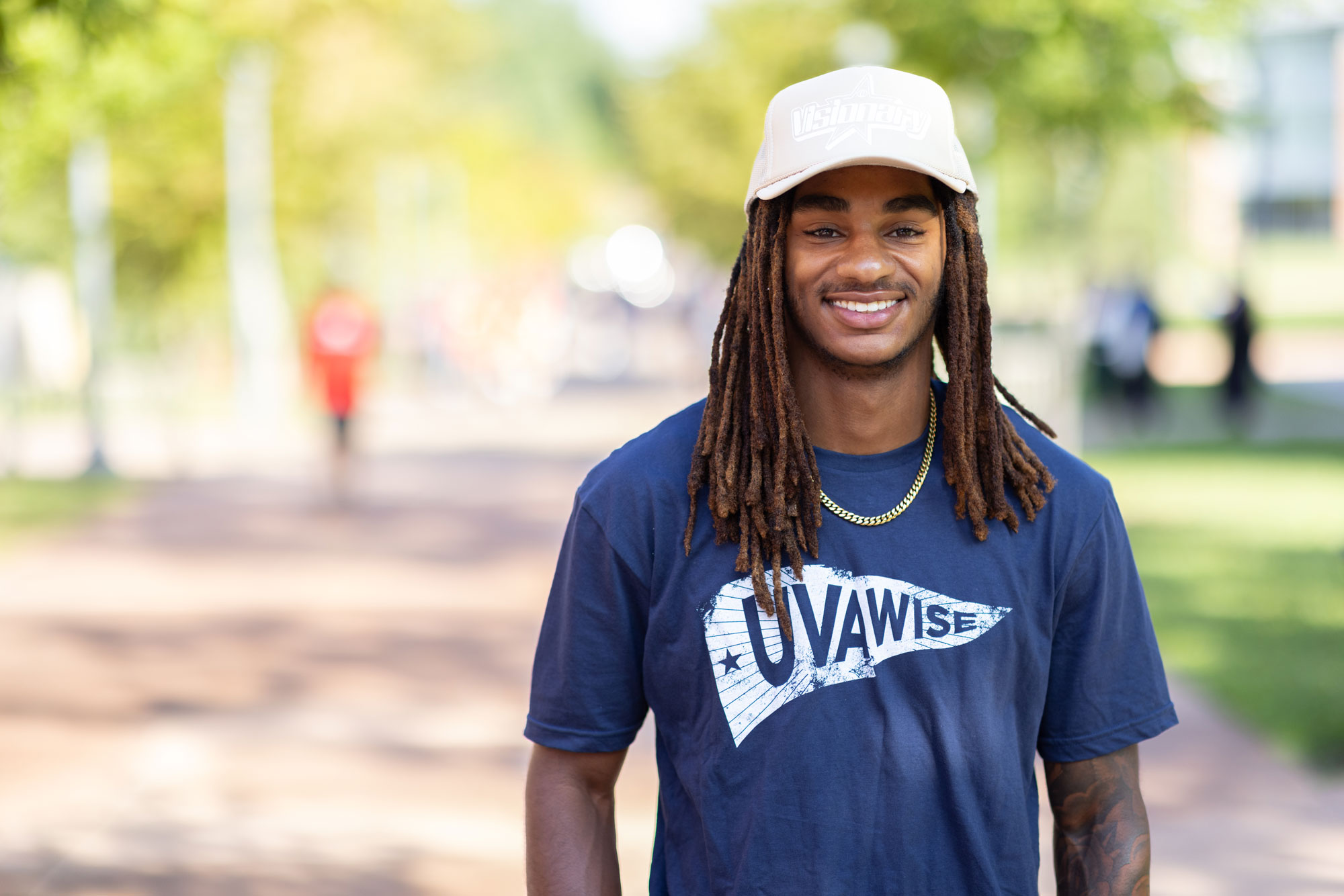 Student in blue Convocation shirt