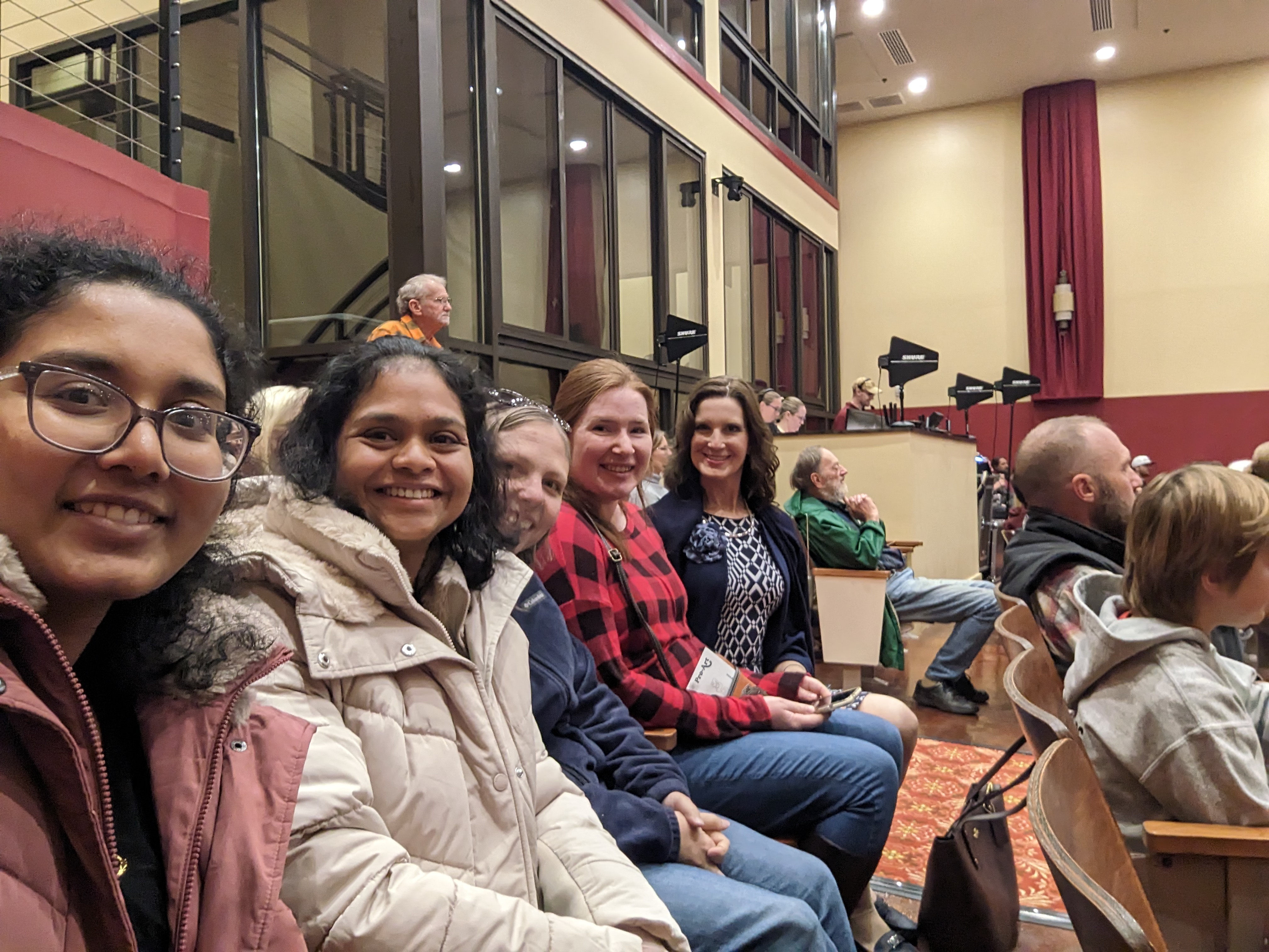new faculty enjoying a play