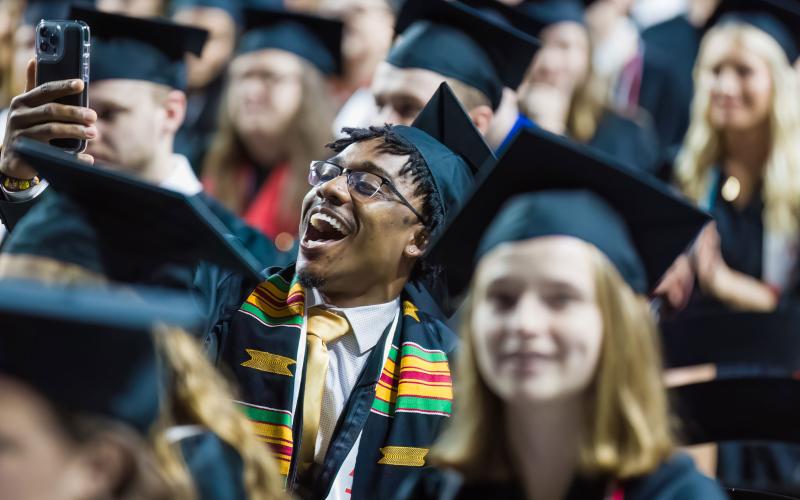 Students in caps and gowns