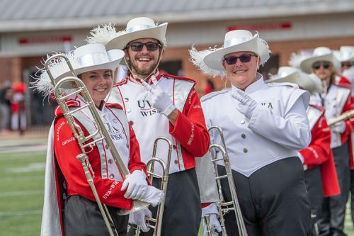 Marching Band members pose at Homecoming 2021