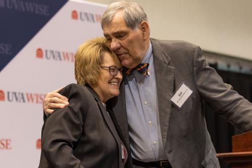 Vickie Ratliff received the William P. Kanto Memorial Award at the Forum on Education at UVA Wise Thursday evening.  Dr. William J. “Bill” Kanto Jr. who presented the award named for his father congratulates her.