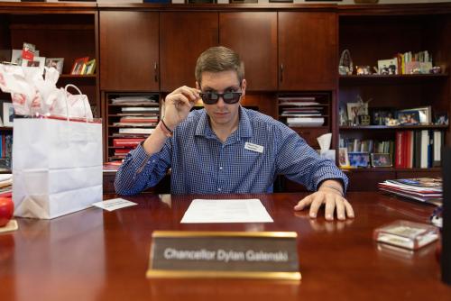 Dylan at Chancellor's desk