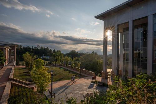 Sunset on campus behind library