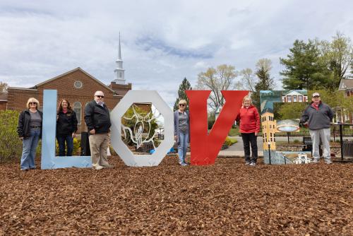 Town of Wise officials and Chancellor with Love sign