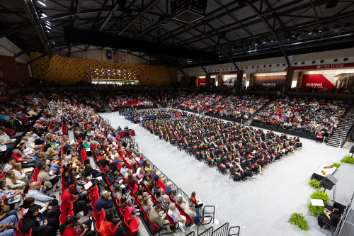 Graduates seated in Convocation Center