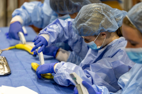 Student in scrubs during workshop