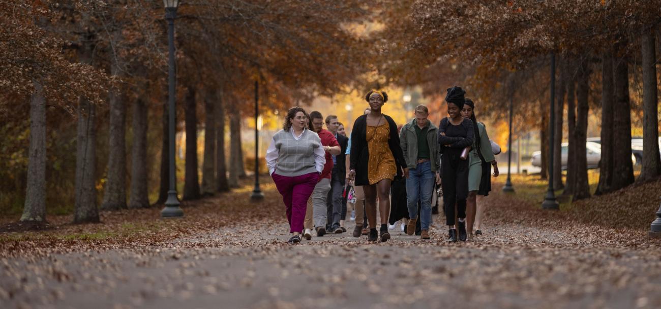 Students walking in a group on campus