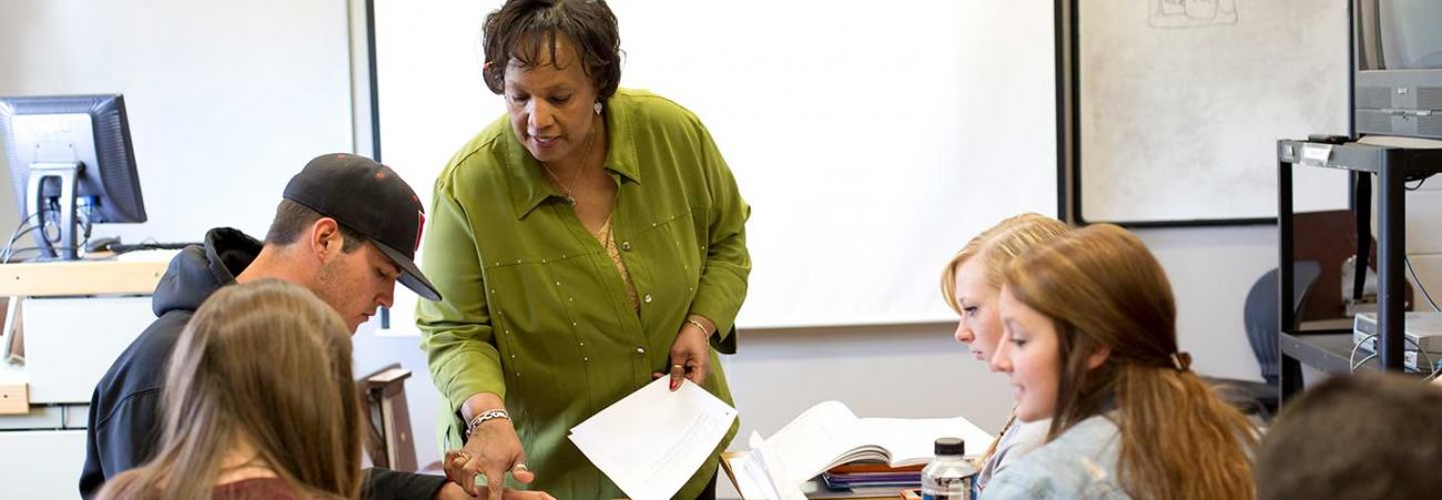 Professor in class with students