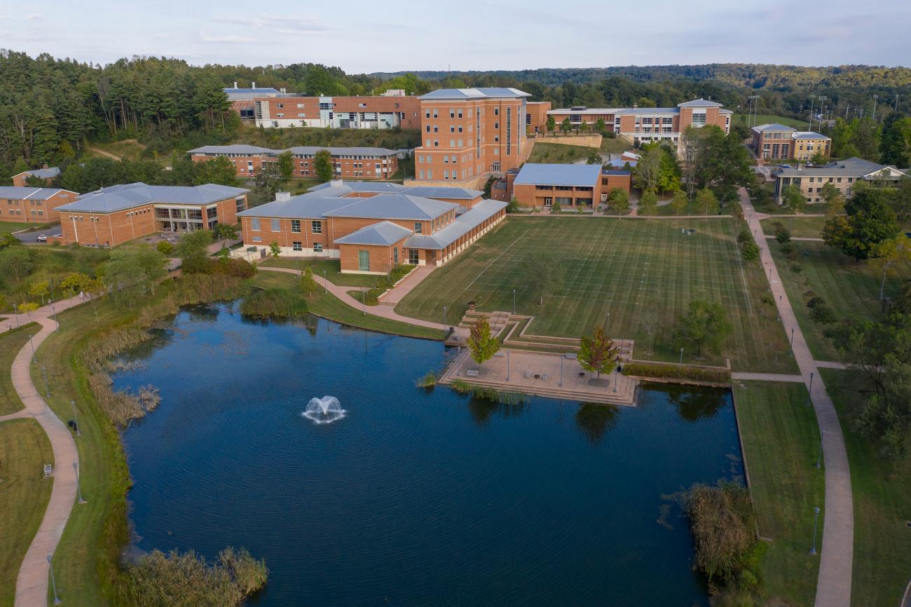 Drone shot of lake and campus