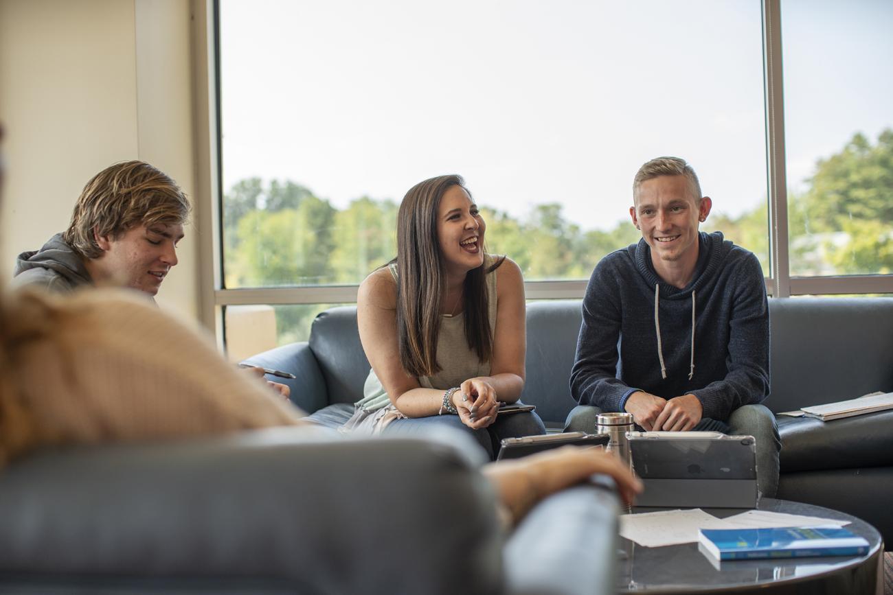 Students discussing and laughing