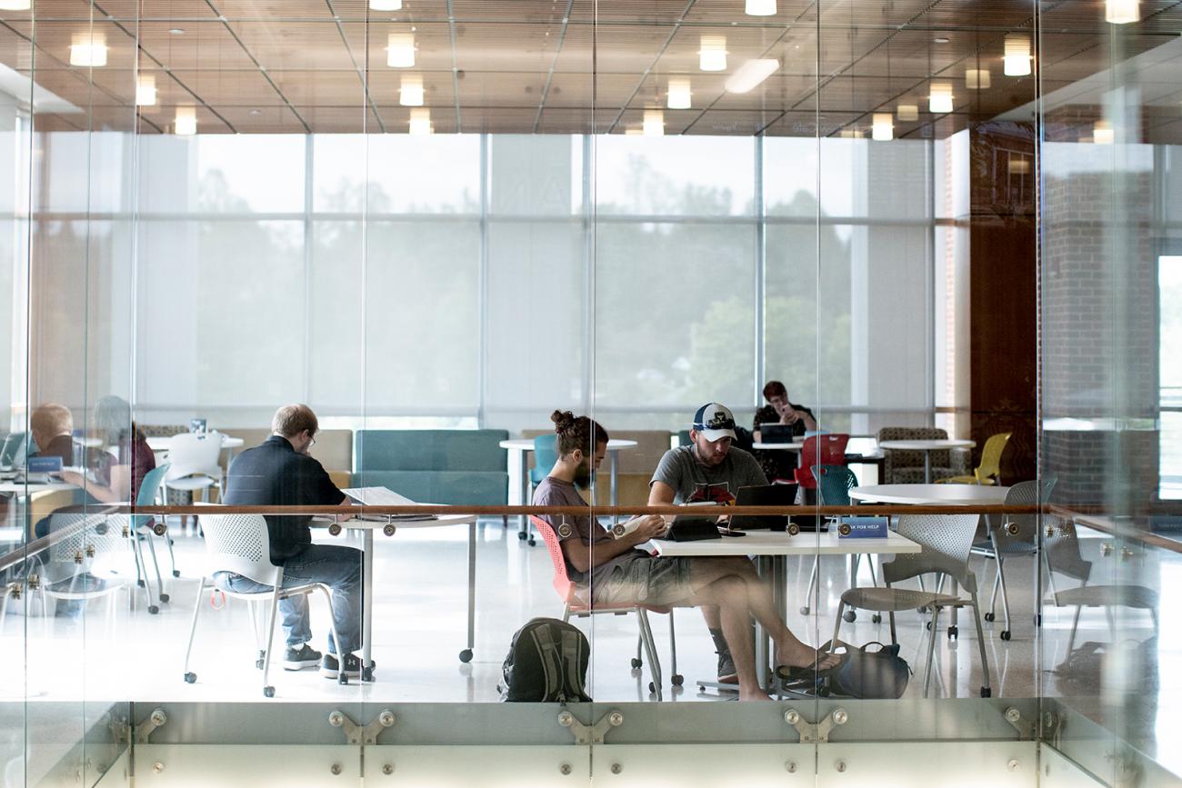 Students at tables in Student Center