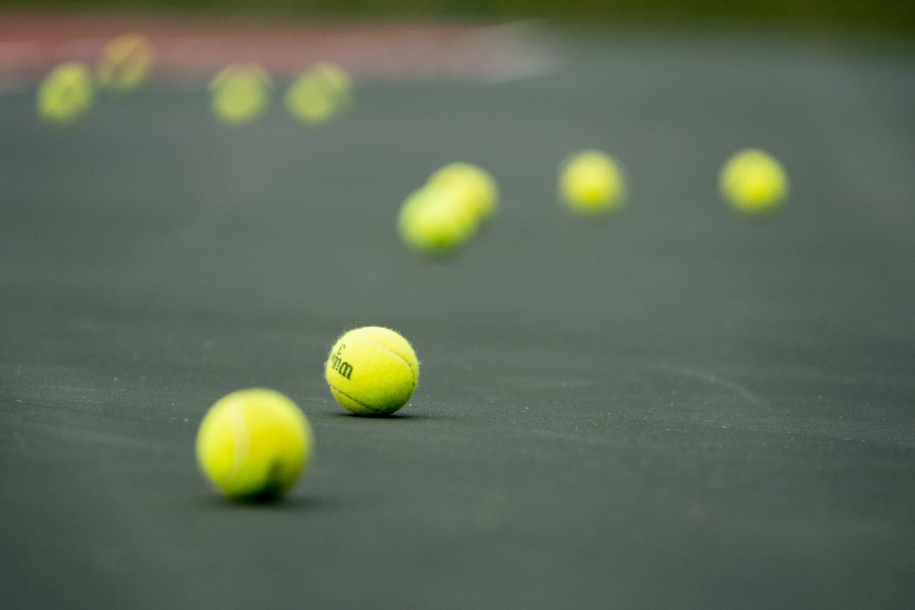 Tennis balls on court