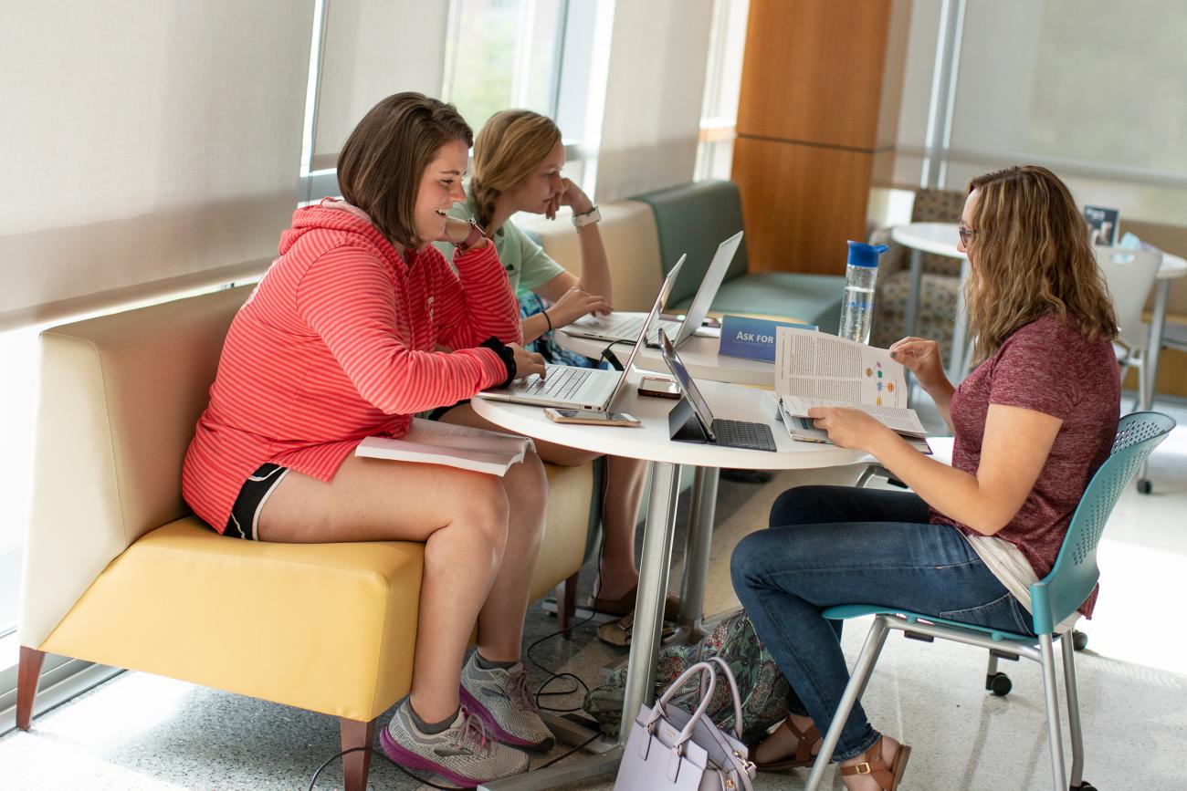 Three women studying together