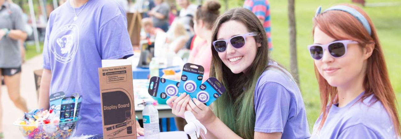 Students at table during club fair