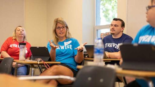 Teachers in discussion in classroom