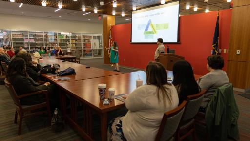 Attendees listen to a presentation