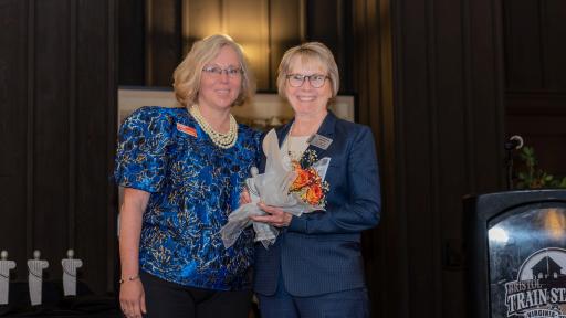 Chancellor Henry is awarded a Tribute to Women honor.