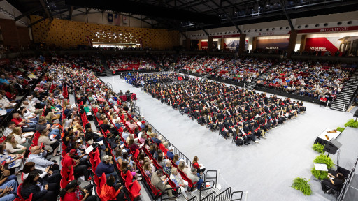 Graduates seated in Convocation Center