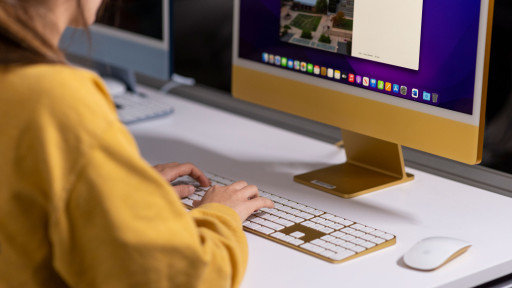 Hands typing at a keyboard